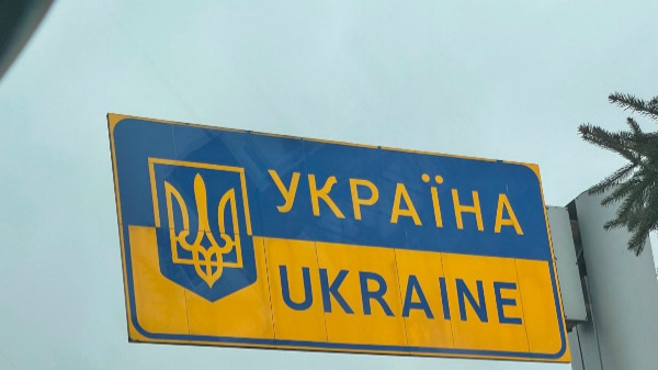 Ukrainian border Crossing Sign Reads Ukraine in English and Ukrainian